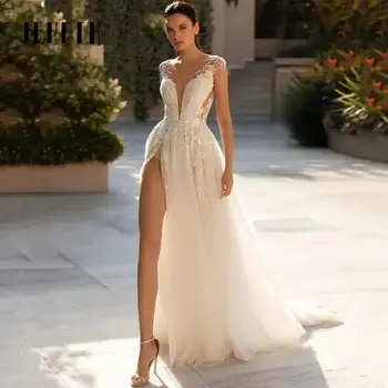 Секси дълбоки V-образно деколте сватбени рокли Безгръб булка рокли елегантен тюл дантела апликации A-Line Vestidos de Novia